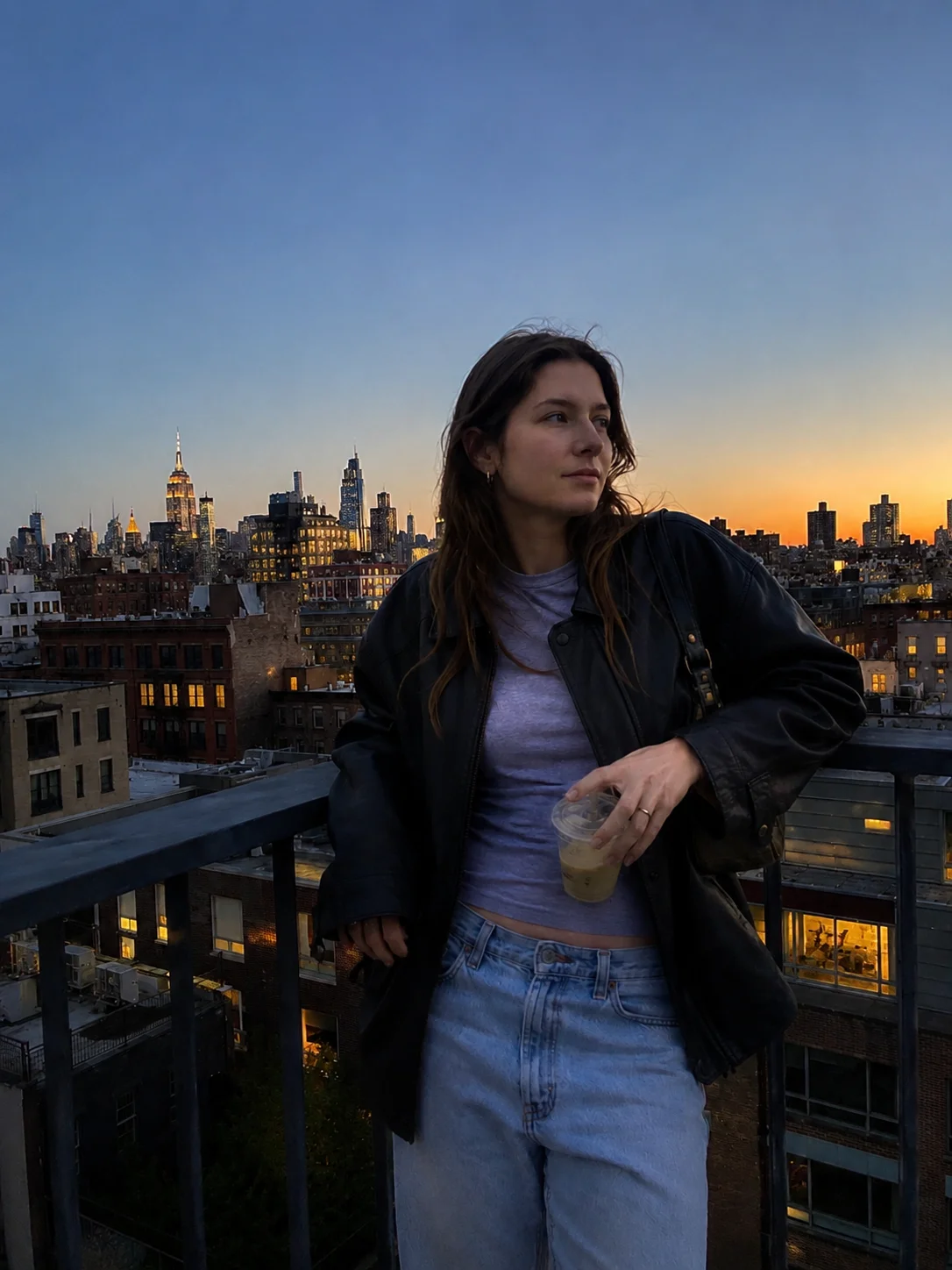 Casual leaning pose overlooking a city skyline