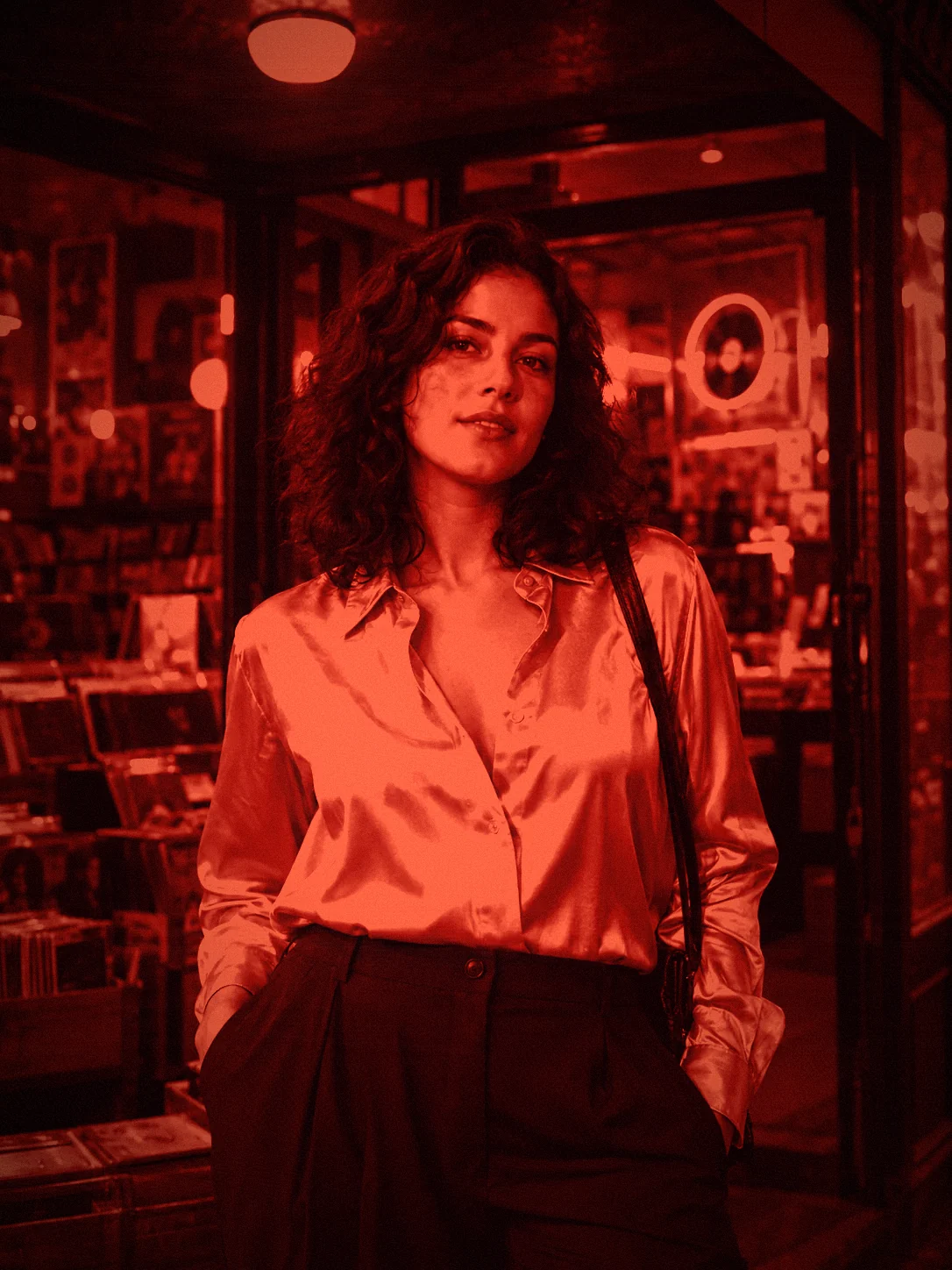Record shop portrait with a darkroom red effect